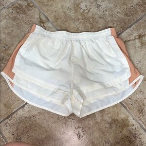 Nike Women's Butter Yellow and Tan Athletic Shorts